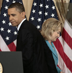 President Barack Obama passes Secretary of State Hillary Clinton before delivering a policy address on events in the Middle East at the State Department in Washington, Thursday, May 19, 2011. (AP Photo/Pablo Martinez Monsivais)